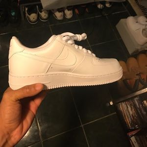 All white Nike Air Forces Low tops