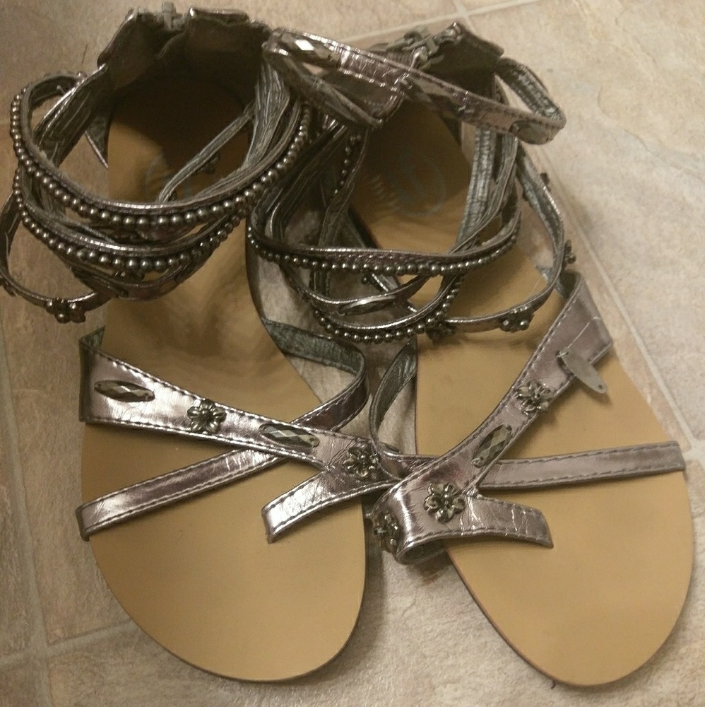 Silver metallic sandals with silver embellishments