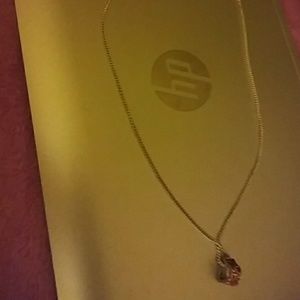 925 sterling silver with Ruby pendant. Very pretty