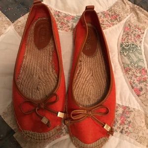 Orange Michael Kors slip ons