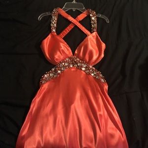 Coral colored  prom dress.