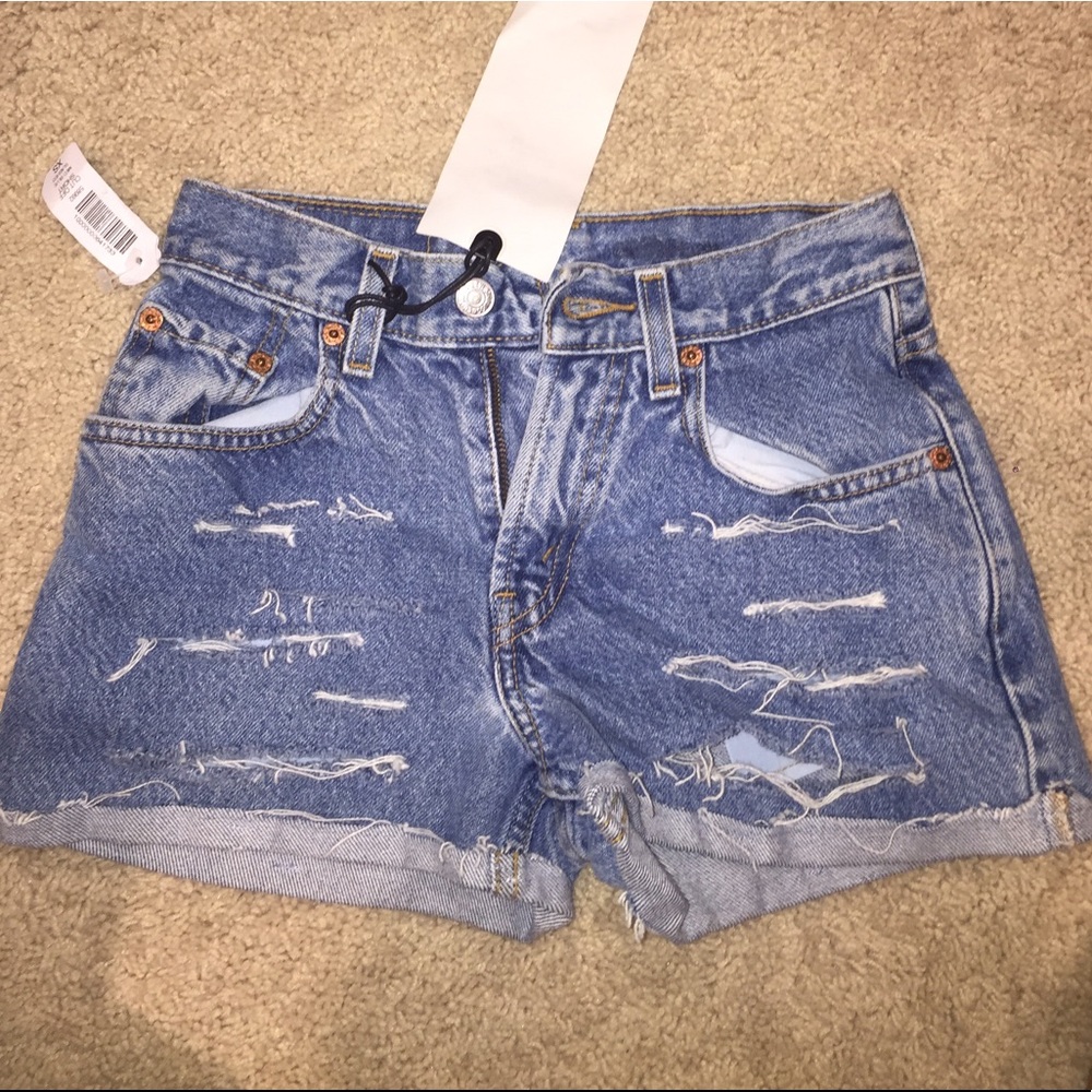 SOLD Levi's Ripped Jean Shorts