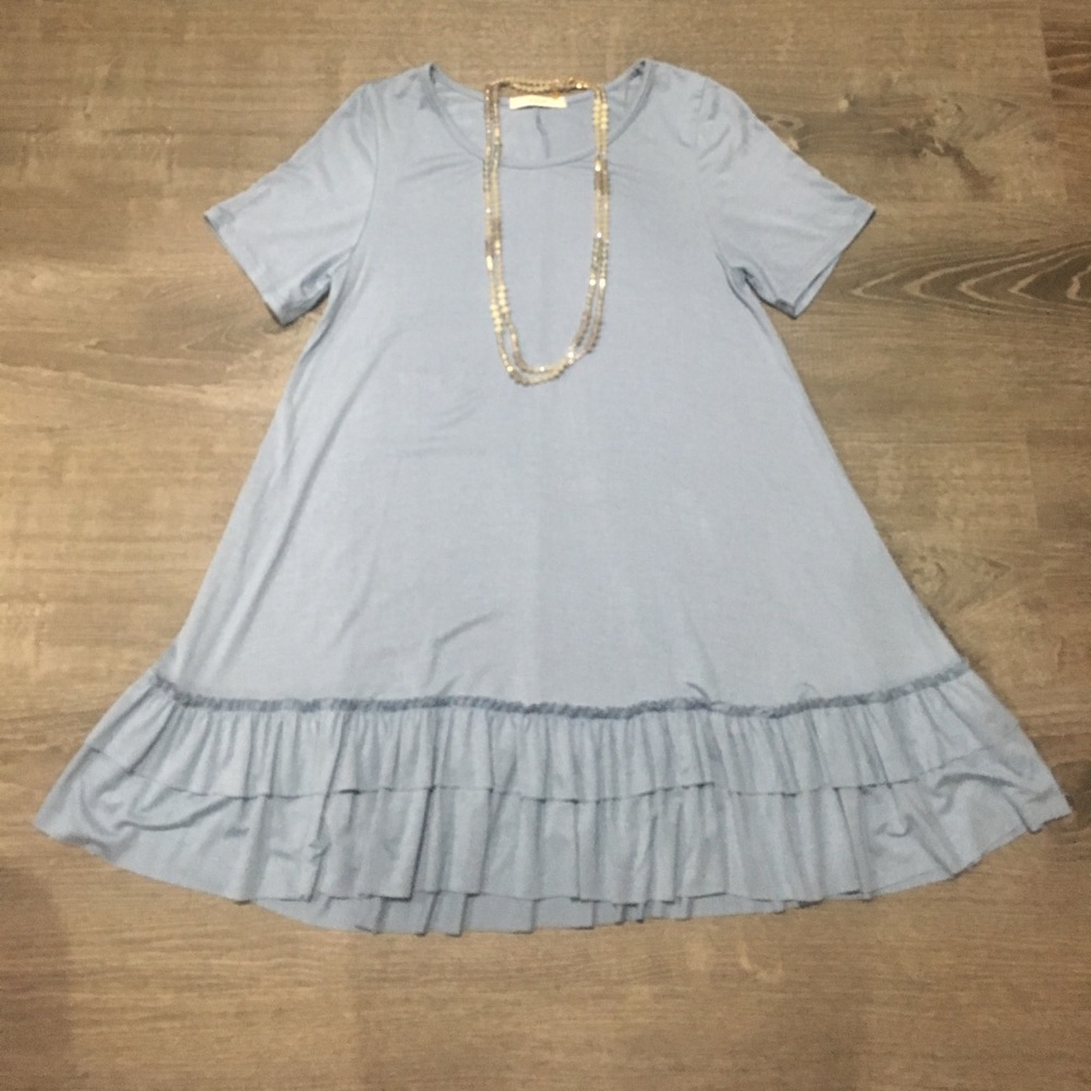 NWOT boutique ruffle hem tunic