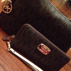 Michael Kors matching wallet and purse.