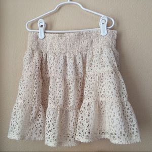 Size medium cream colored fluffy skirt