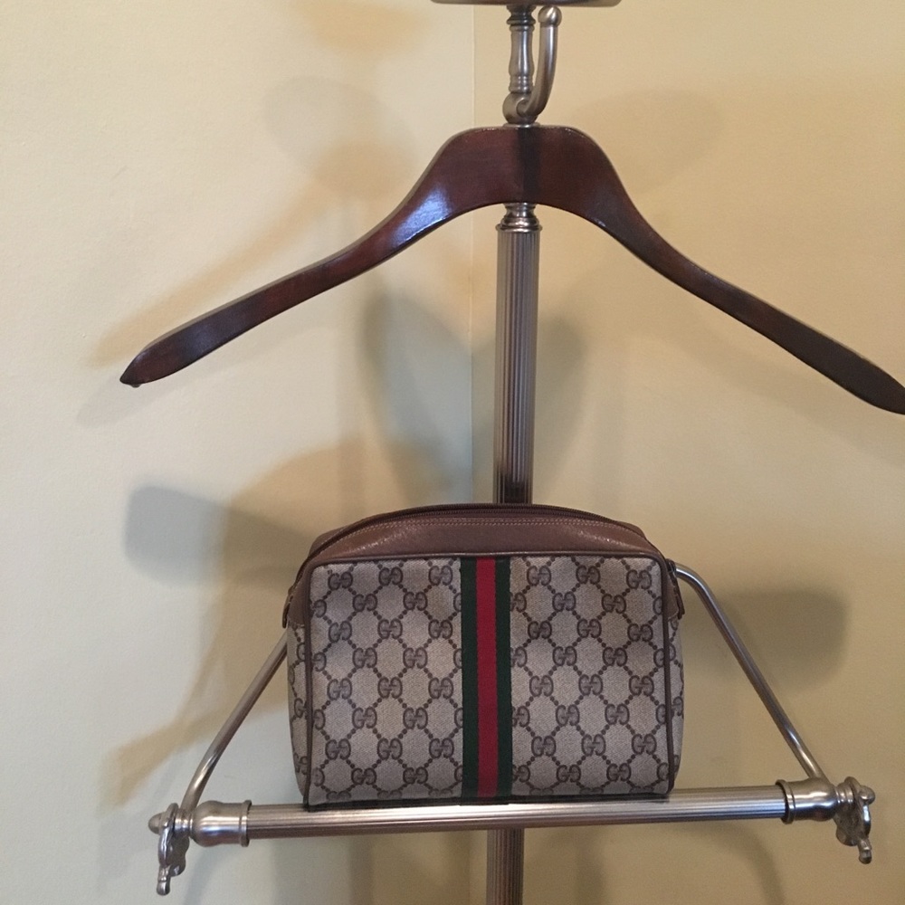 Monogram authentic Gucci Clutch.
