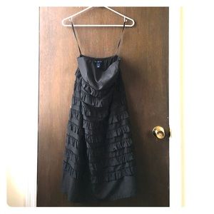 Strapless black ruffle dress