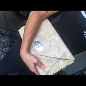 Perlina snakeskin clutch