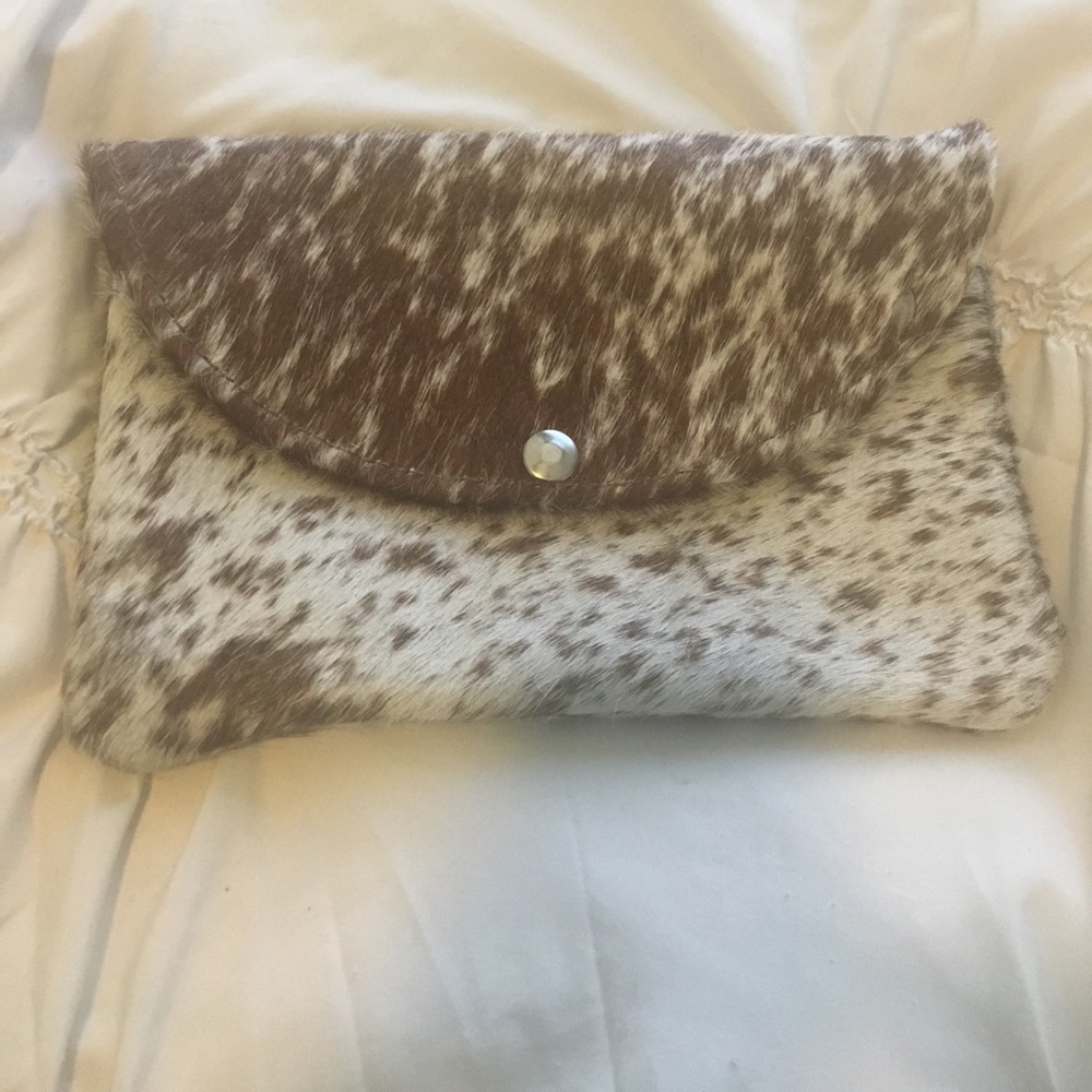Brown cow hide pattern clutch!