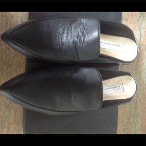 Kristin Cavallari black slip ons.