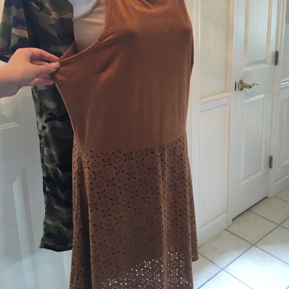 Beautiful brown suede dress with cutouts.