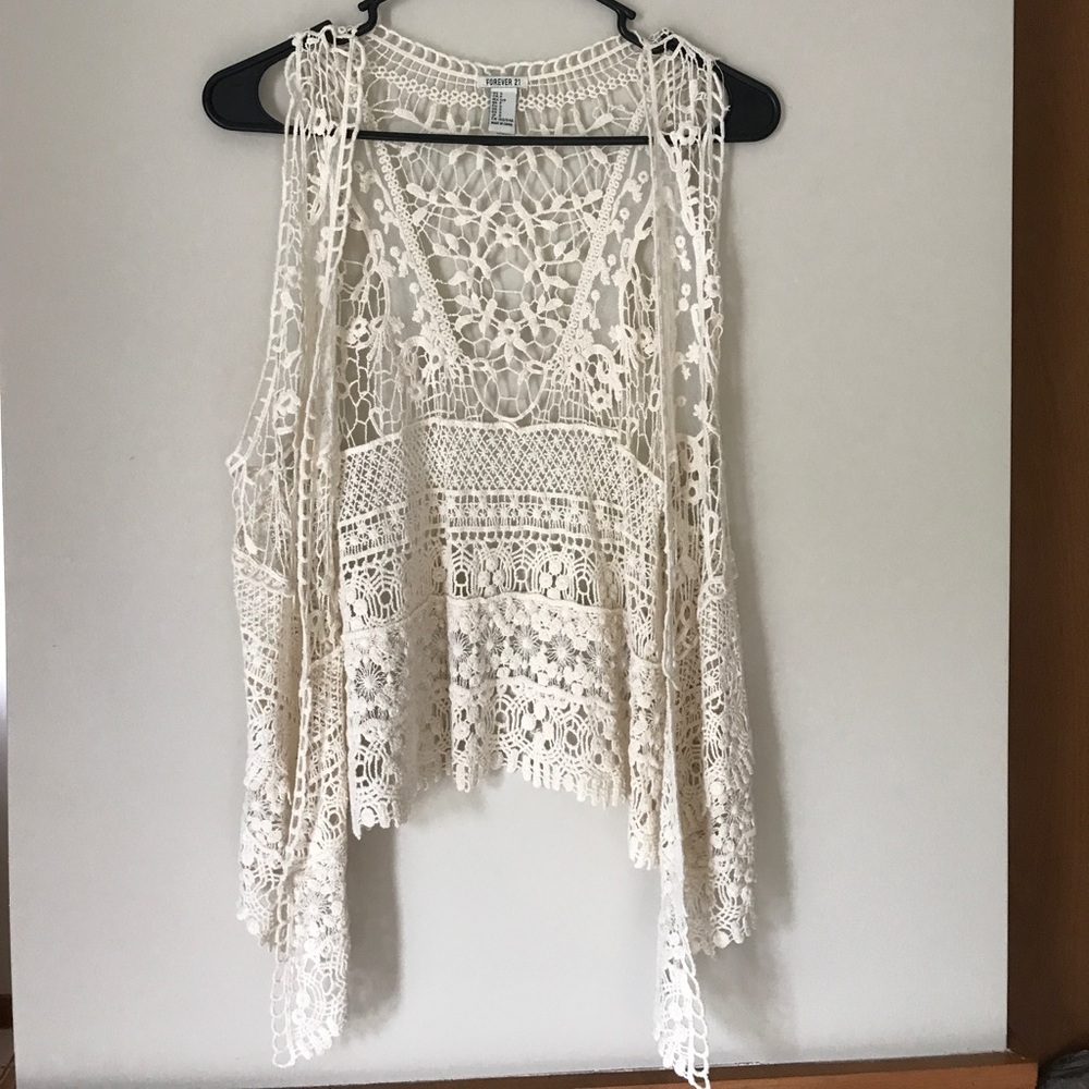 Cream colored knit vest