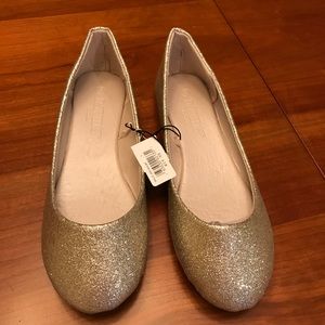 Cute glitter flats. Never worn.