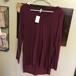 Maroon shirt sequence down the sleeves