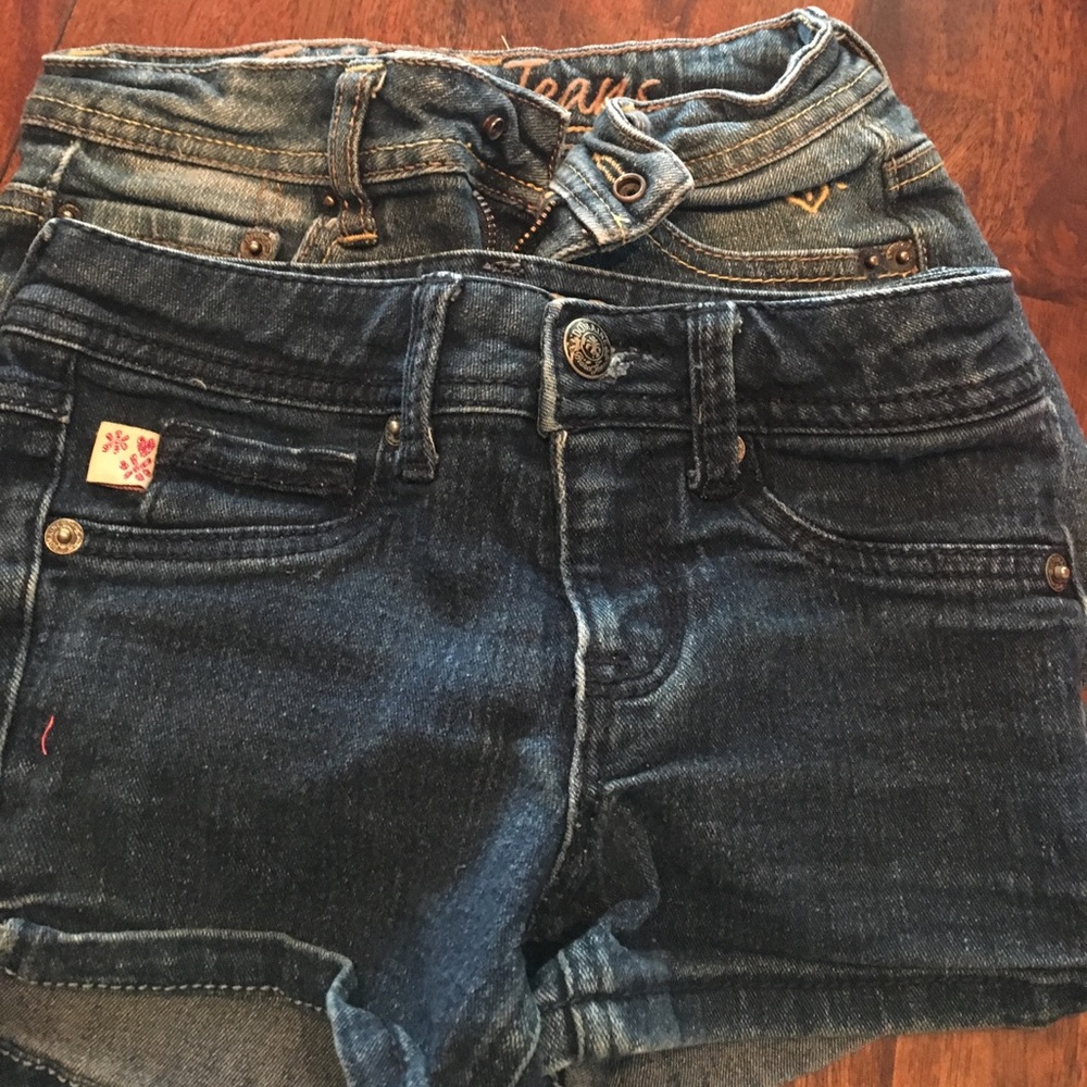 two pairs of jean shorts