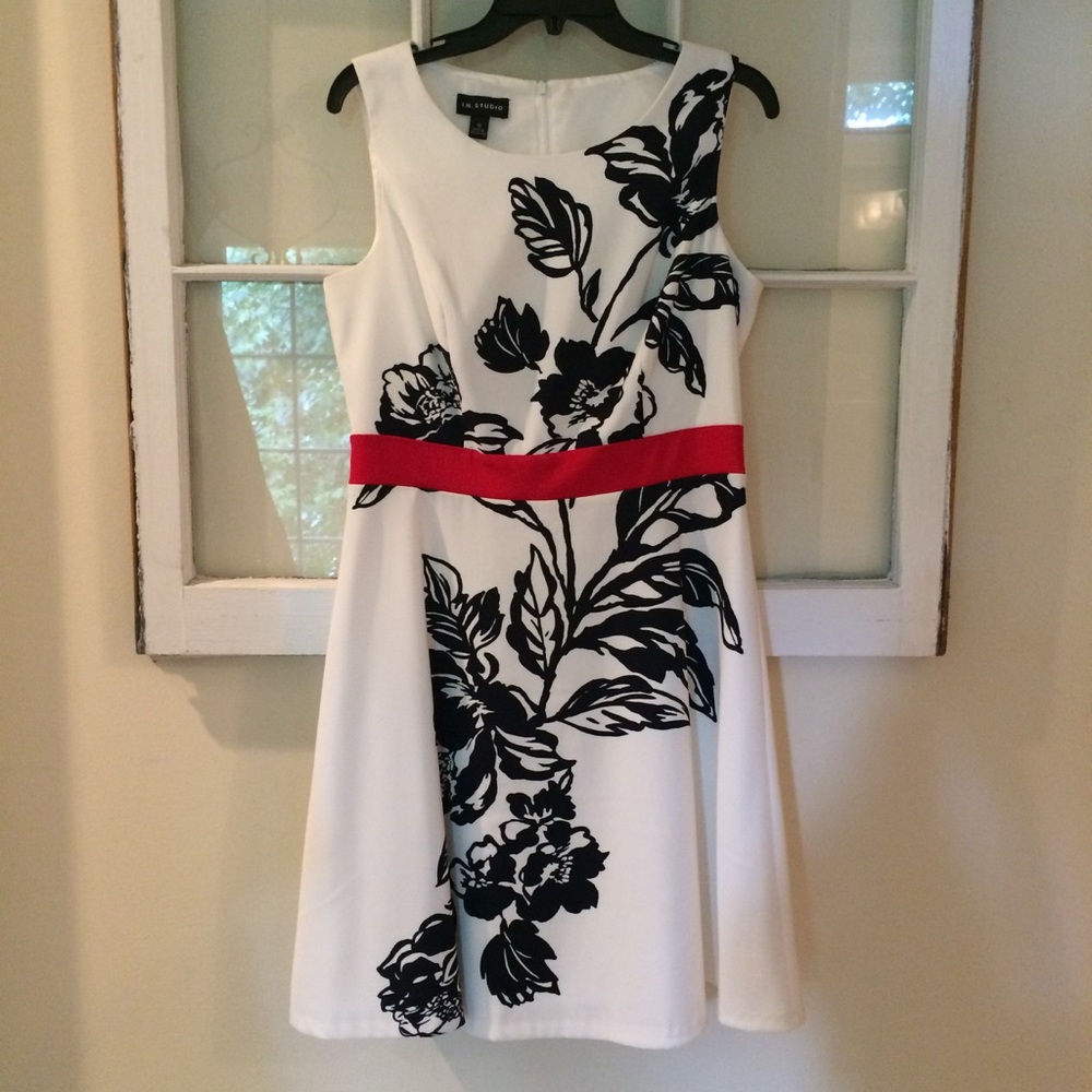 White, red & navy, dress with red sweater.