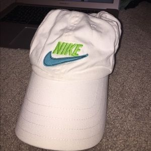 White adjustable Nike baseball hat.