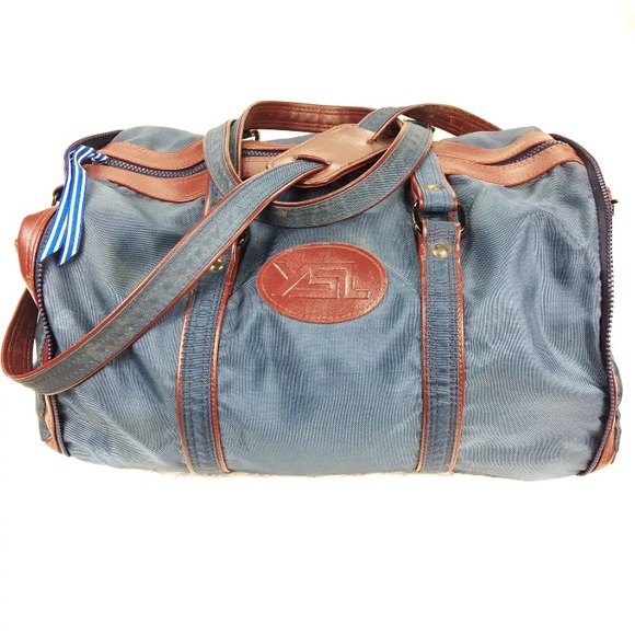 Yves Saint Laurent Handbags - YSL small duffle/travel bag