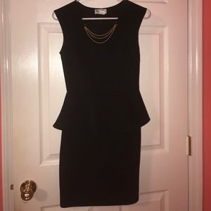 Black peplum stretch dress only worn once