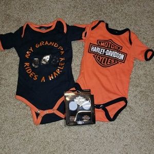 Two Harley Davidson onesies and baby booties