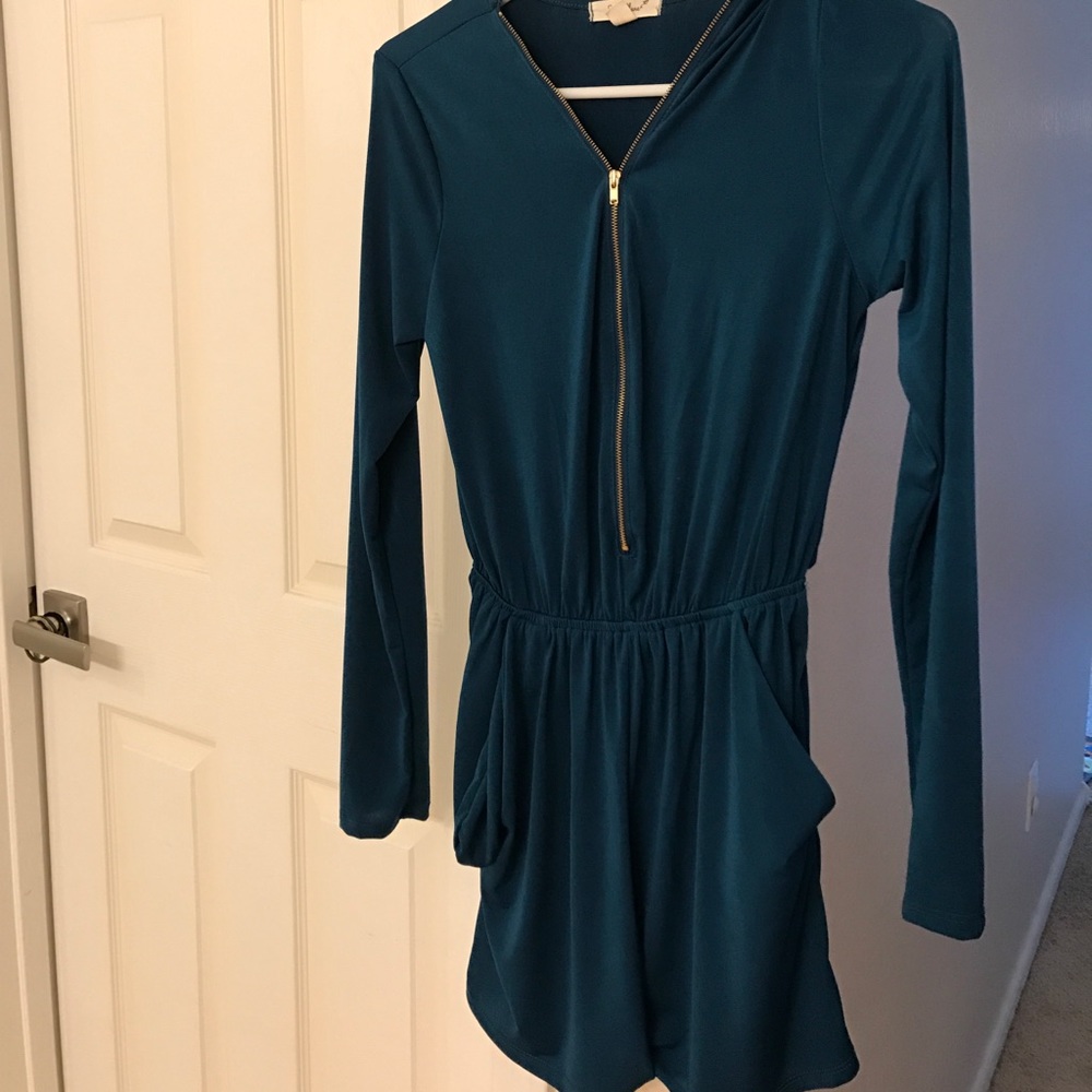 Long sleeve romper with pockets in size s