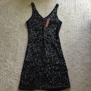Black sequined body con dress