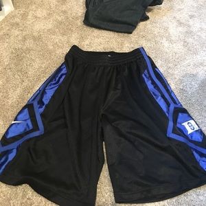 Nike blue and black athletic shorts