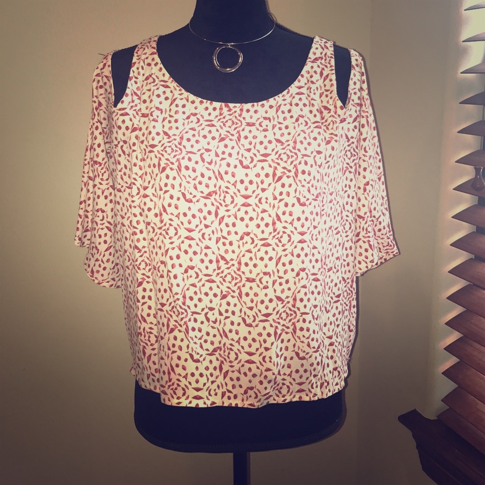 Cupcakes and Cashmere cold shoulder swing top