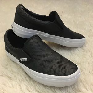 VANS black leather perf slip ons W5