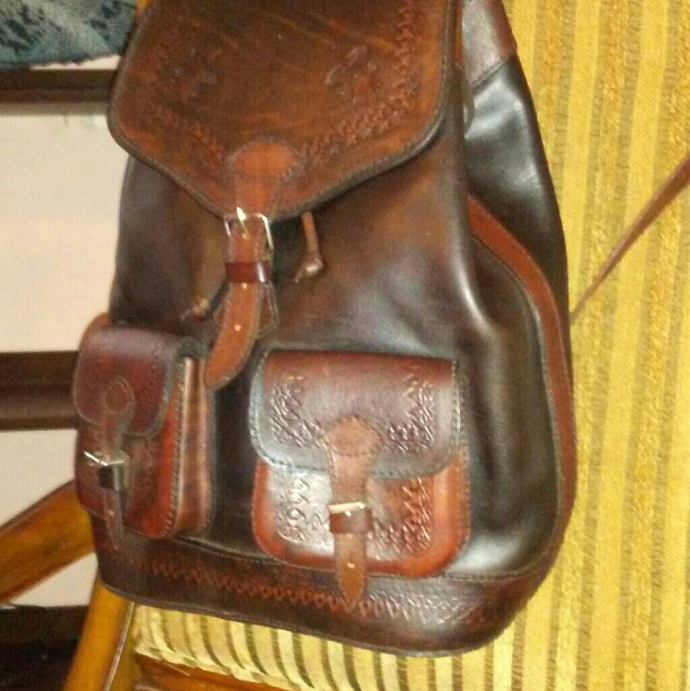 Handmade multi color leather backpack.