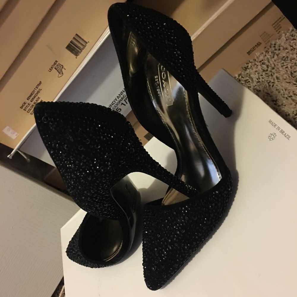 Black sparkling beautiful black Coach shoes.