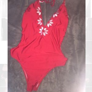 Two Red One Piece Swimsuits