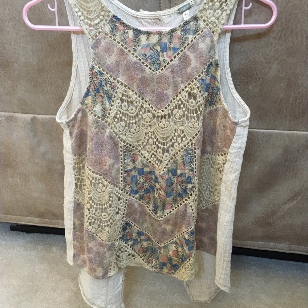 Slightly open back buckle tank