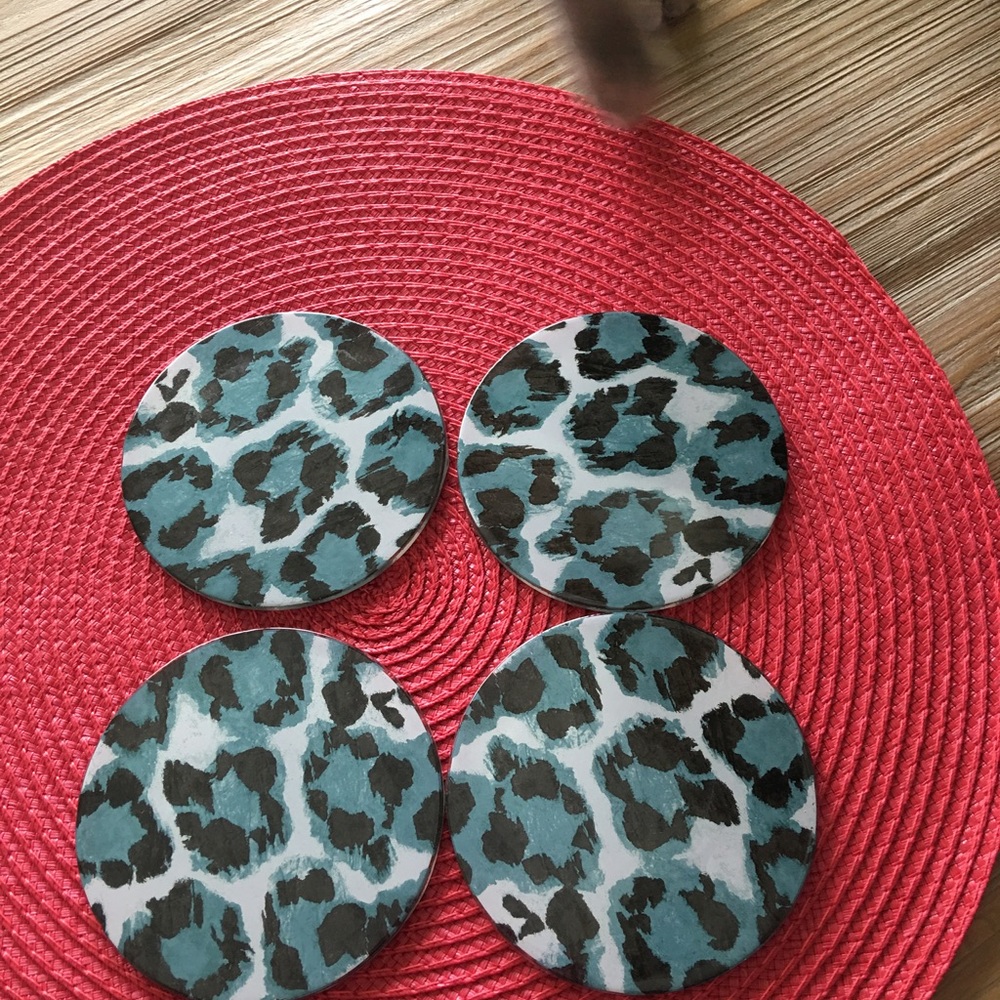 DVF 4 Glass coasters.  In great shape.
