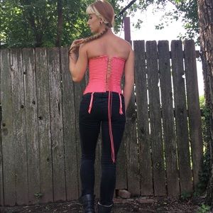 Bright pink corset with tags