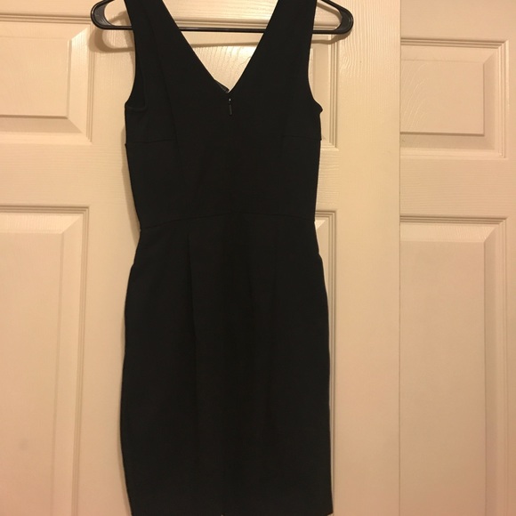 Black short dress with pockets - Picture 2 of 3