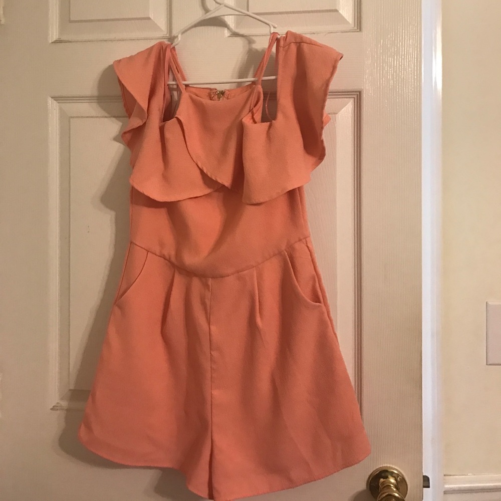 Peach Romper size Medium