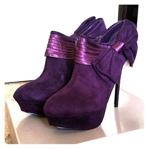 Purple booties with a cute bow on the side!