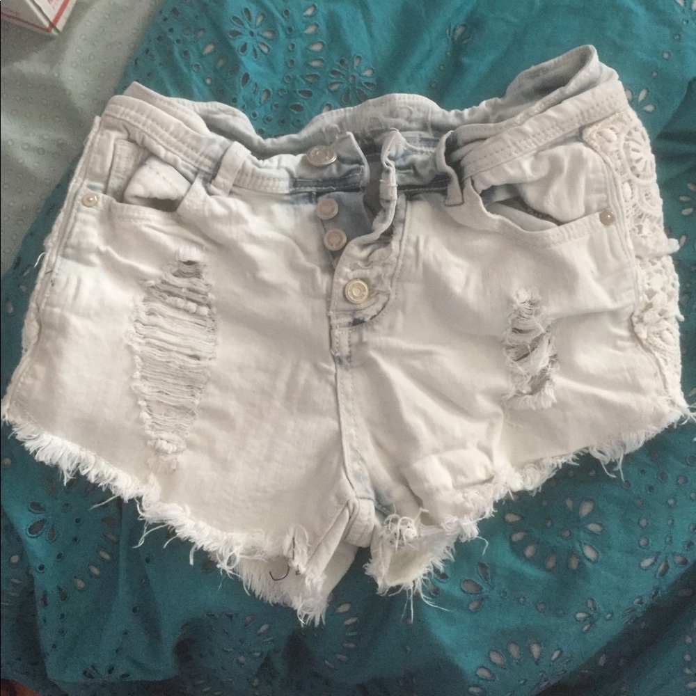 distressed short shorts with side floral design