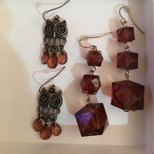 Two pair of earrings with brown beading