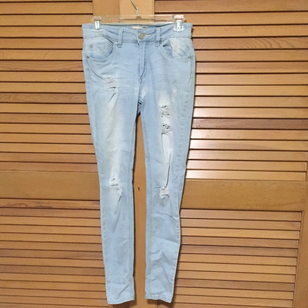 Distressed Light Washed Skinny Jeans