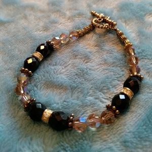 Beaded bracelet of clear & black beads