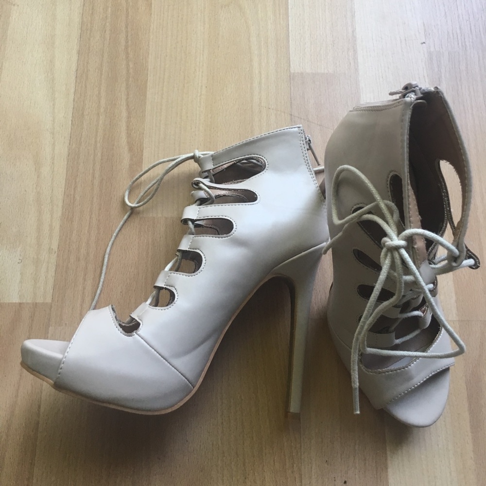 Lace up peep toe booties with platforms