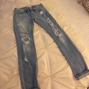 distressed skinny jeans, never worn