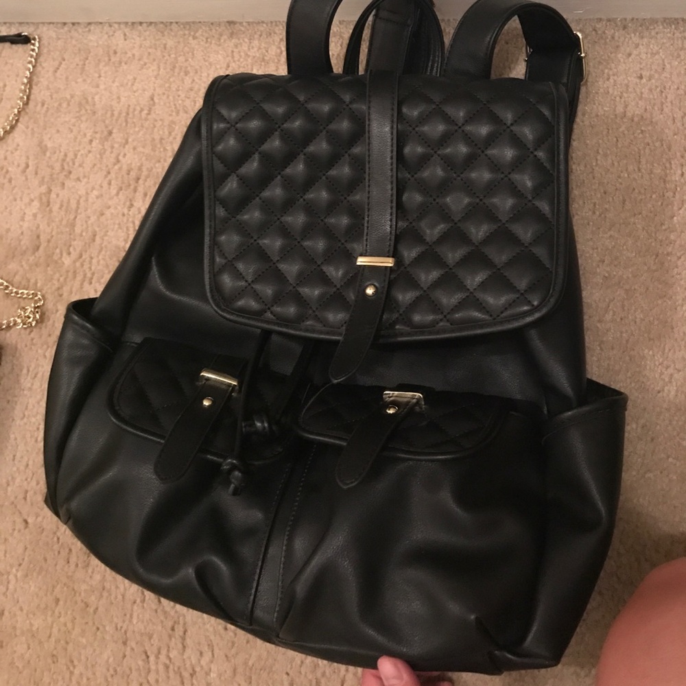 Black and gold backpack