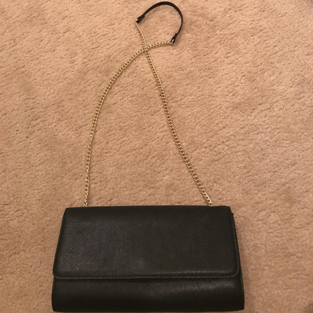Black and gold clutch with gold chain