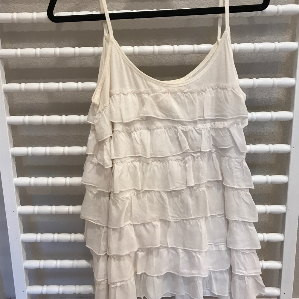 White ruffled blouse