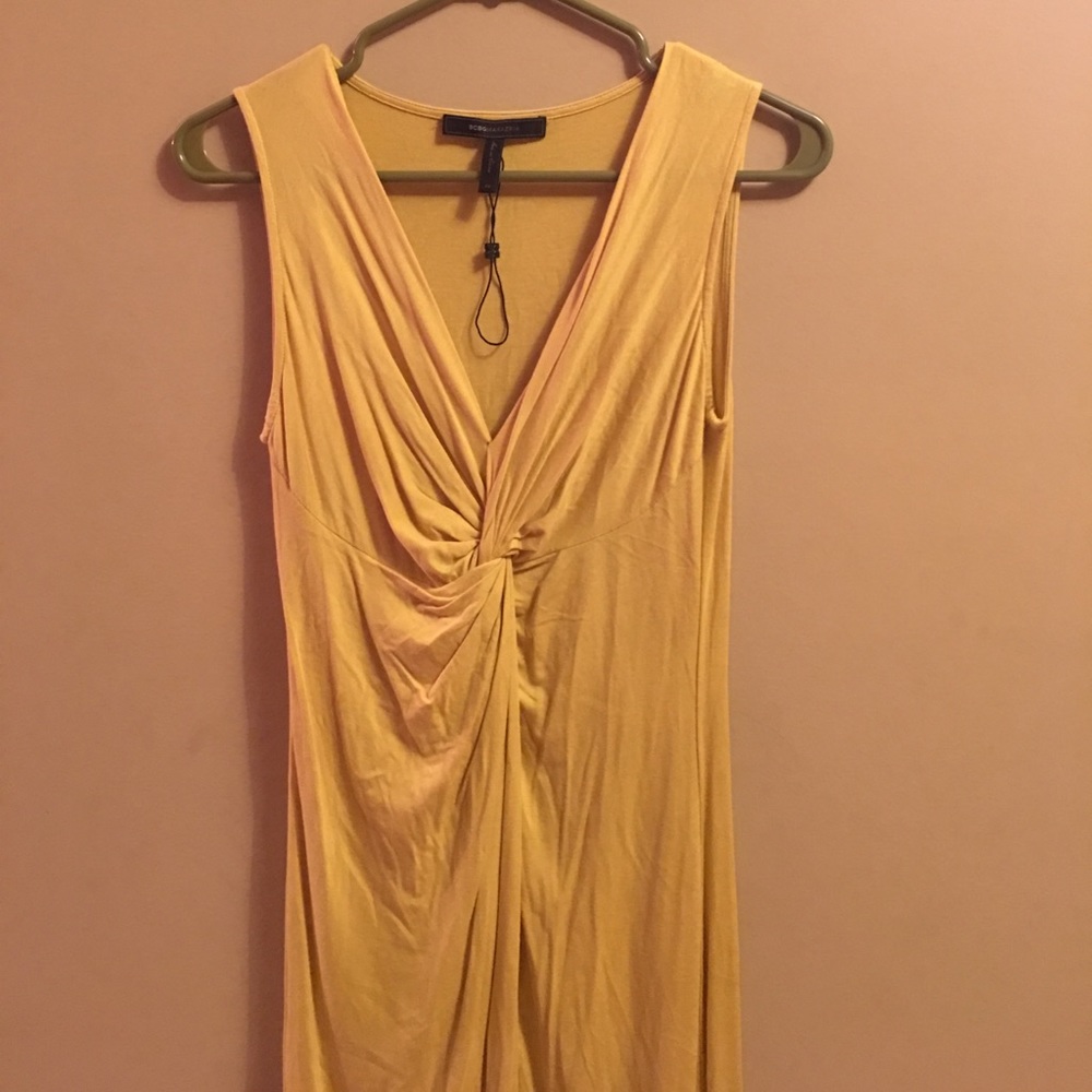 Light yellow mustard BCBG dress xs fitted in back