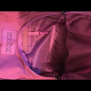 Jansport Dark Pink Laptop Backpack leather bottom