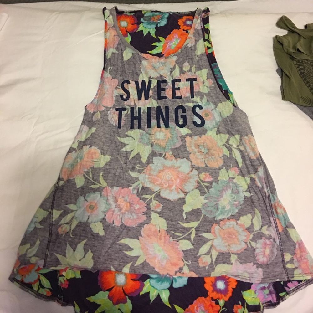 Cute tunic or tank top by roxy in a size M